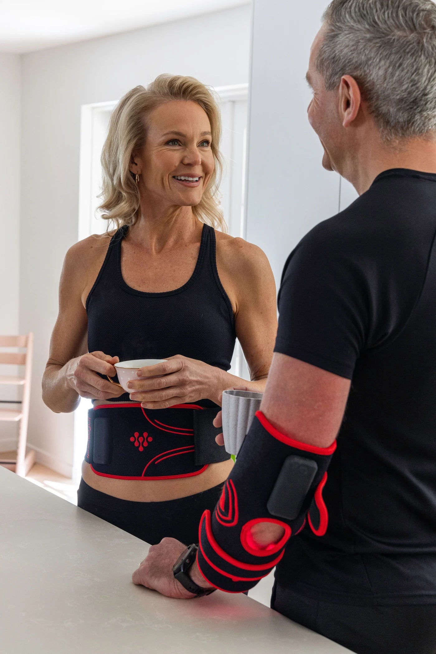 Creator filming with the Infraredi Body Wrap at home