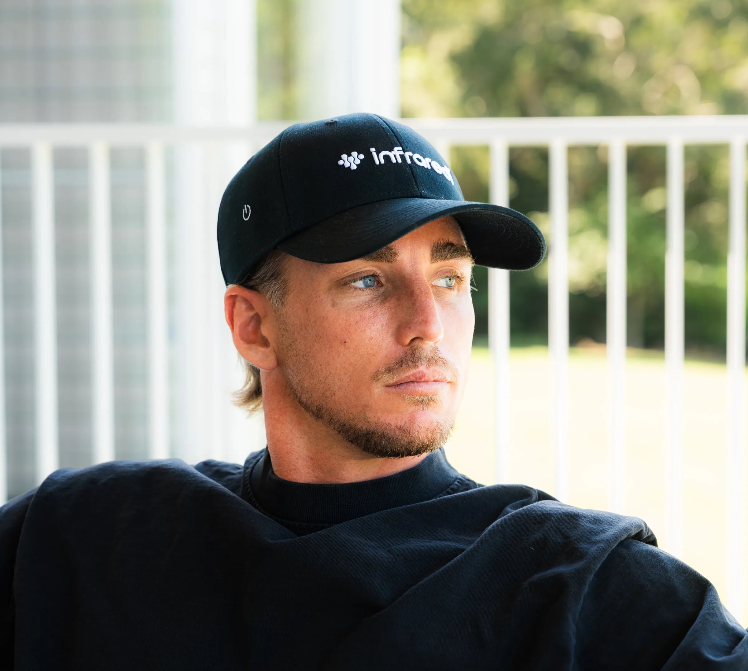 Man wearing the Infraredi Hair Growth Hat.