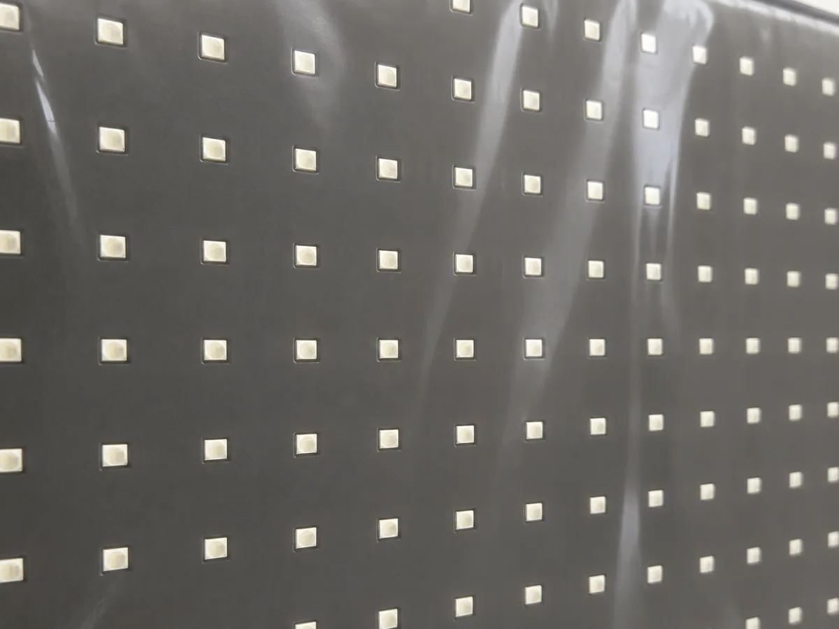 Close-up of a competitor wrap's glossy plastic surface over its LEDs